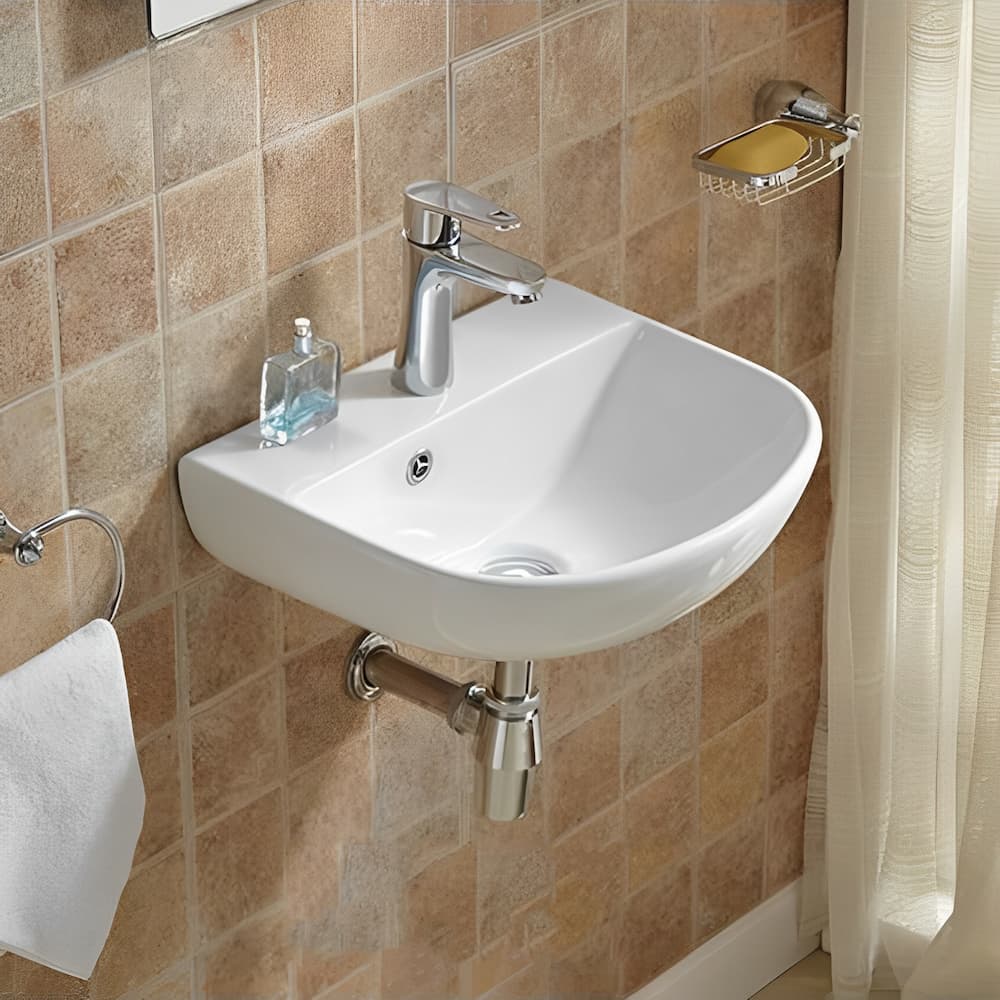 Carrida Fine Ceramic 440mm Gloss White Oval Wall Hung Basin with silver faucet in a bathroom setting