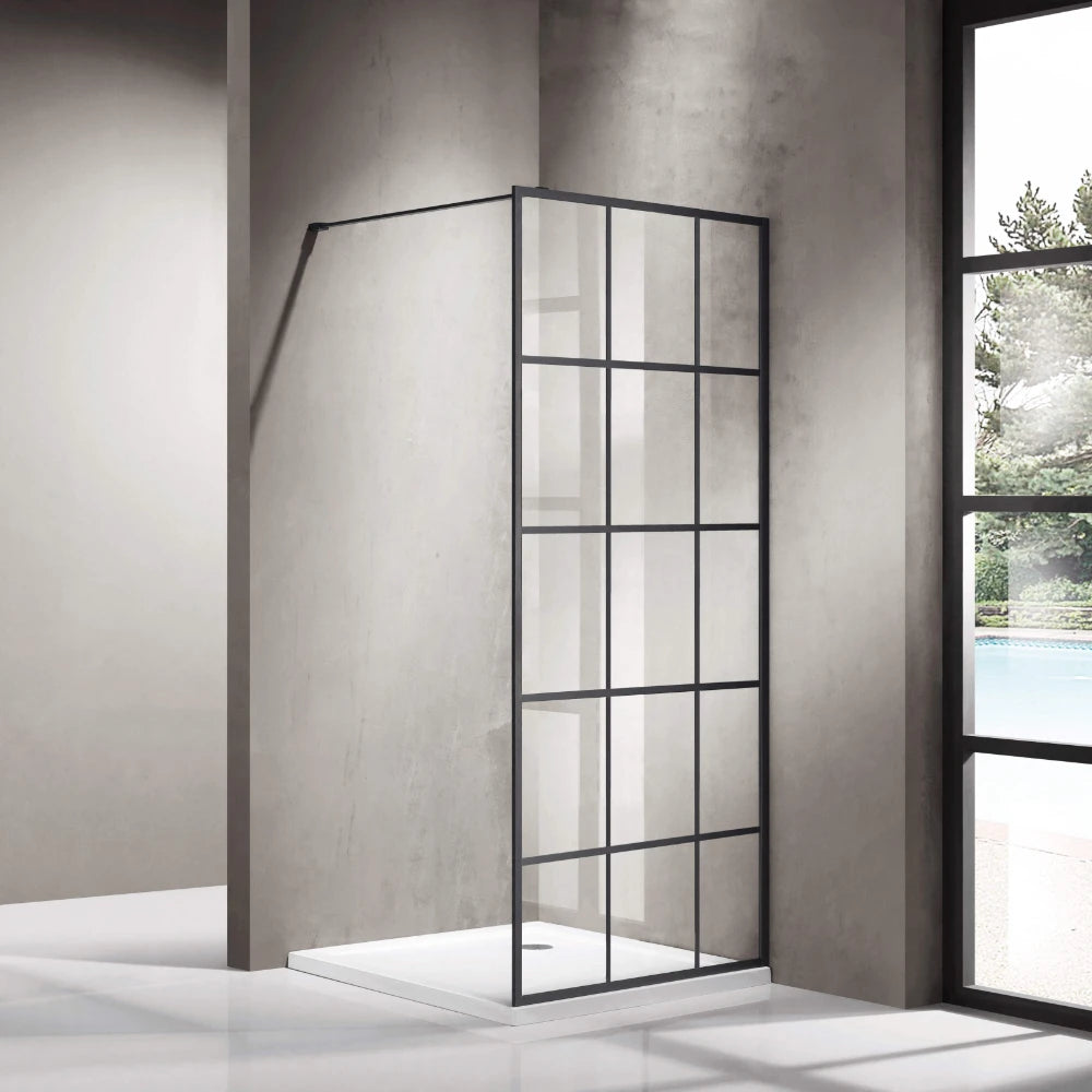 Covey 1200mm matte black framed walk-in shower screen with 15-printed grill pattern.