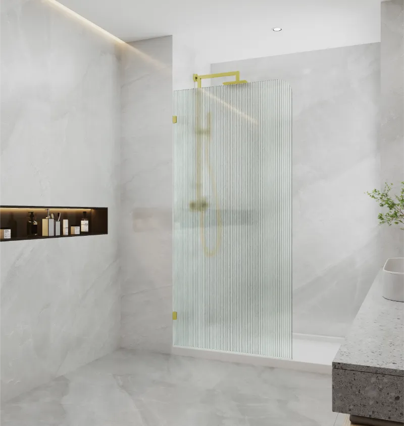 Covey frameless walk-in curved corner fluted glass shower screen panel with brushed gold fitting finish in modern bathroom