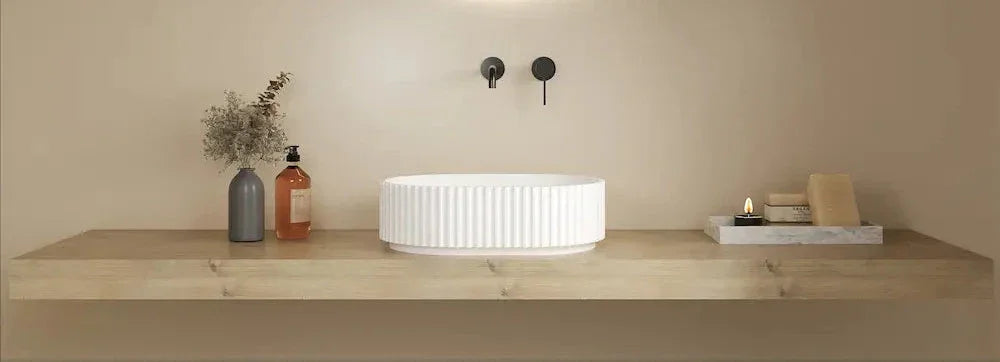 Vienna fluted white basin on wall-mounted vanity with modern tapware and decor, Secasa Home.