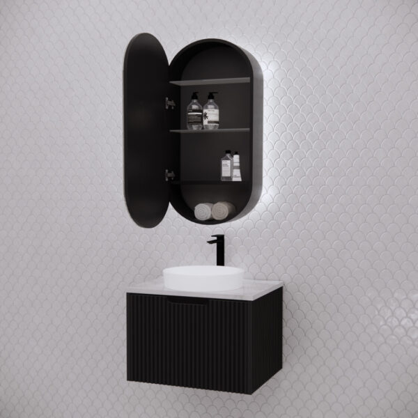 Modern black bathroom vanity with round mirror cabinet, LED lighting, and white tile wall