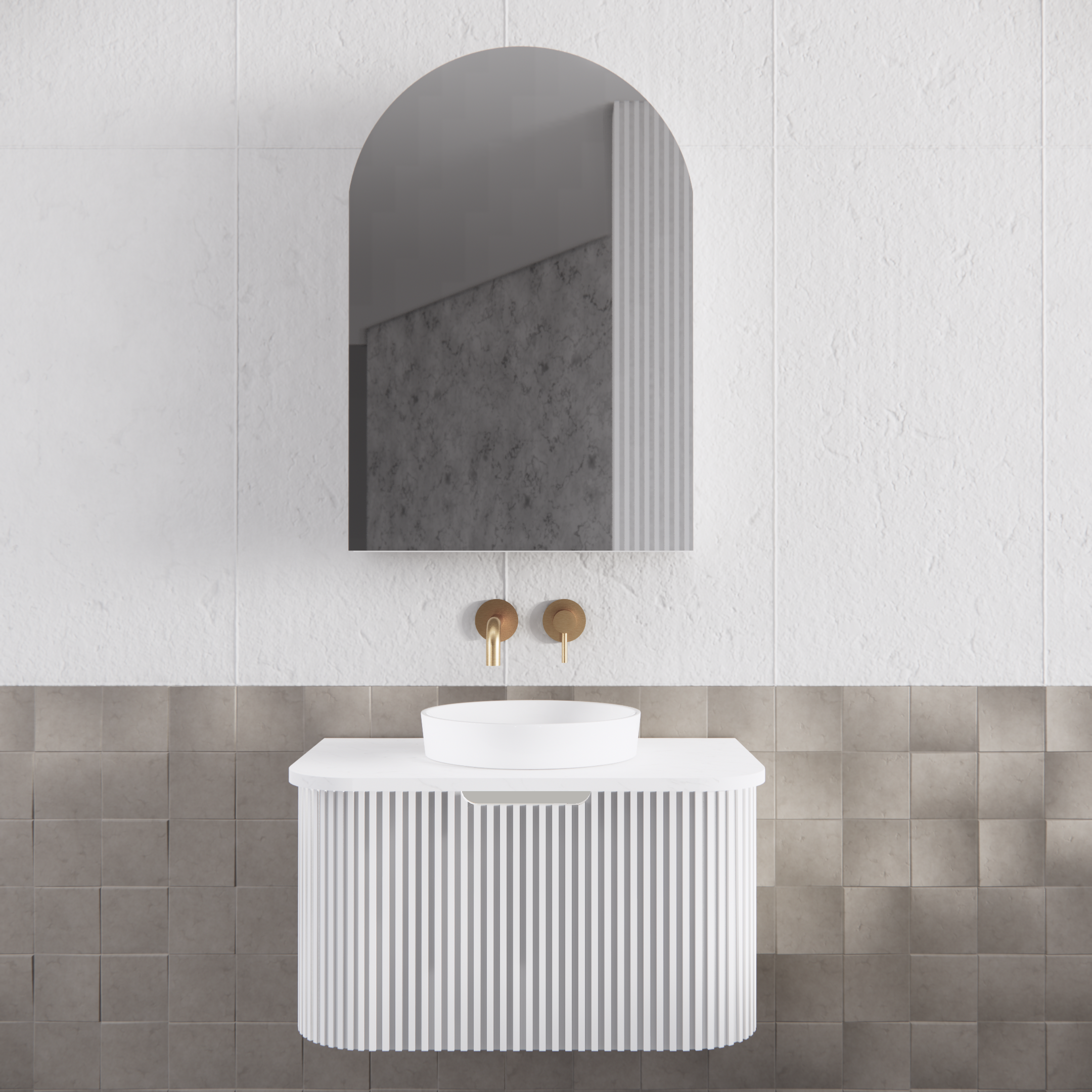 Modern white fluted bathroom vanity with round basin, brass tapware, and arched mirror