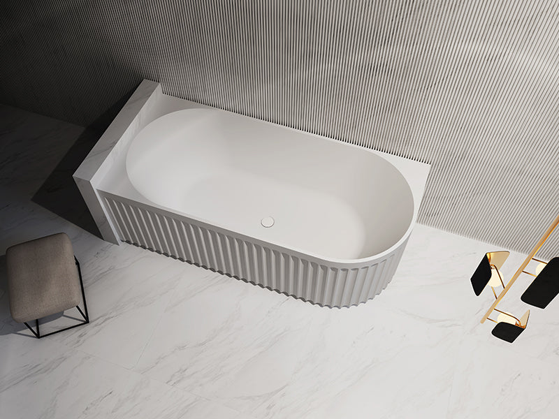 Modern freestanding white bath with fluted design in a minimalist Secasa Home bathroom