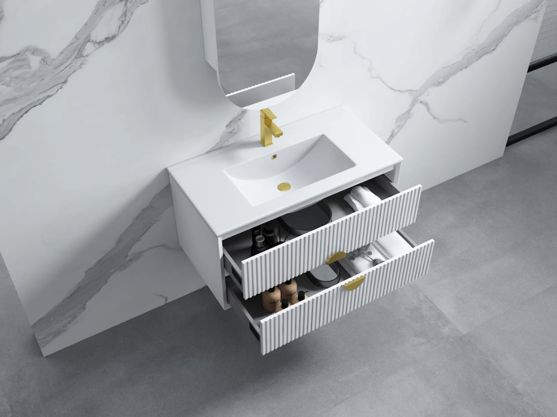Modern white bathroom vanity with two open drawers, gold tapware, marble wall, Secasa Home