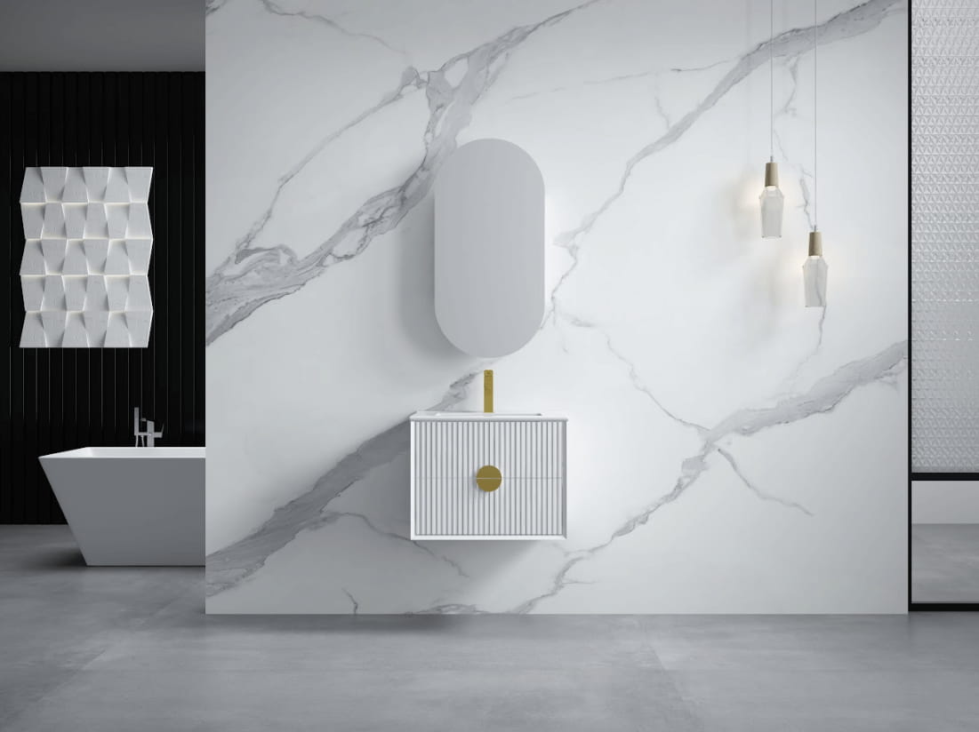 Modern bathroom with white fluted vanity, marble wall, gold tap, and pendant lights by Secasa Home