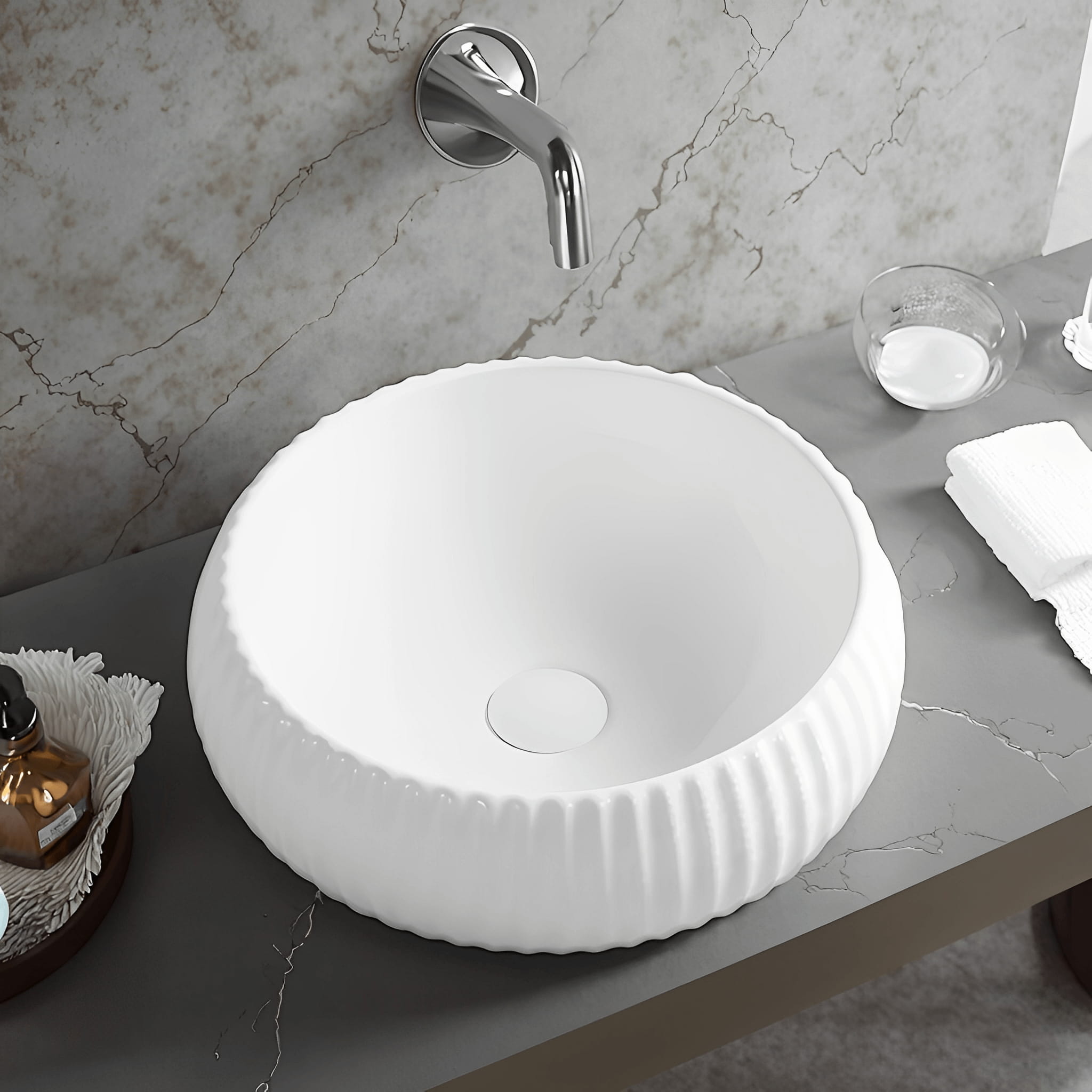 Lukka Oran Fine Ceramic Fluted Art Basin in round shape, 400×400×140 mm, Matt White on a marble countertop with a silver faucet.