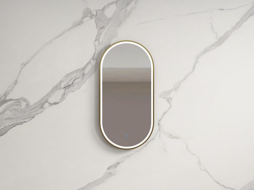 Modern oval LED bathroom mirror mounted on marble wall, Secasa Home decor