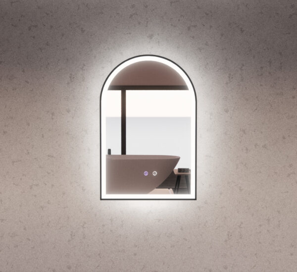 Modern arched LED bathroom mirror with touch controls, reflecting a freestanding bath
