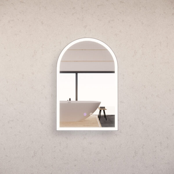 Arched LED bathroom mirror reflecting modern freestanding bath, minimalist interior design