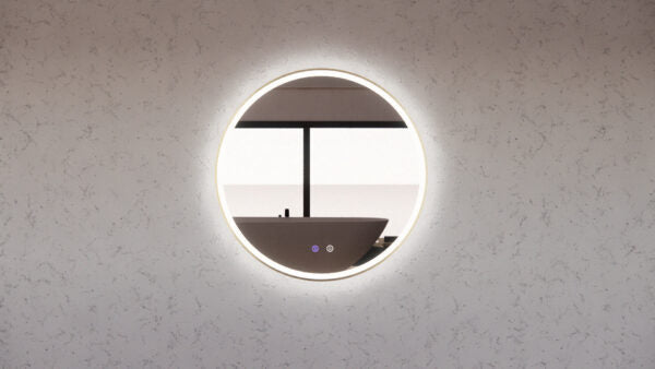 Modern round LED bathroom mirror with touch controls, reflecting a freestanding vanity sink