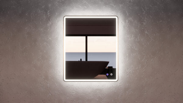 Modern LED bathroom mirror with backlit frame reflecting freestanding bath and large window