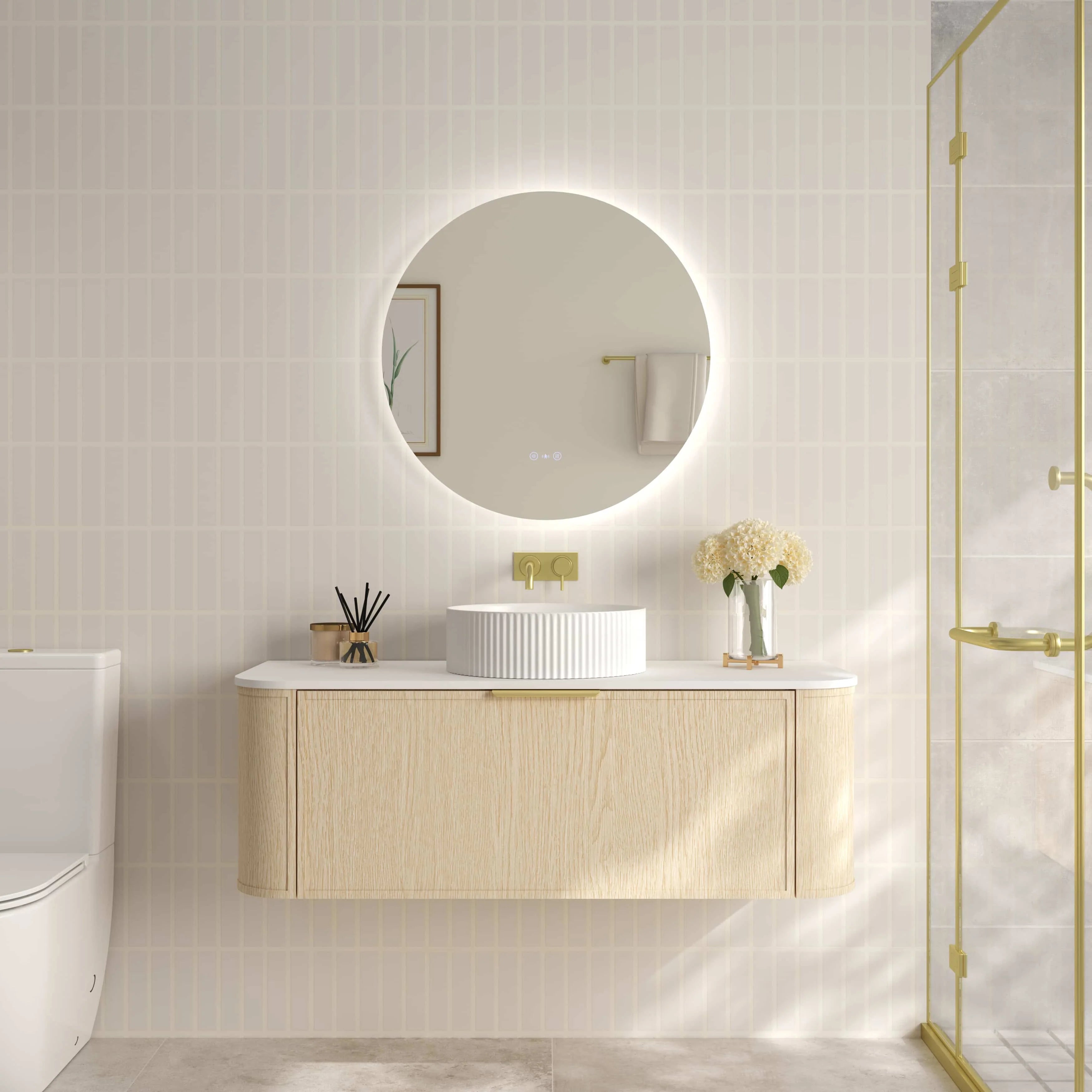 Mercio Elva 1190mm Curved Wall-Hung Vanity in Natural Oak, featuring a single soft-close drawer and rounded edges, elegantly styled in a modern bathroom setting with a counter-top basin.