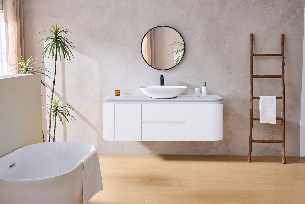 Modern bathroom with white vanity, round mirror, and wooden ladder.