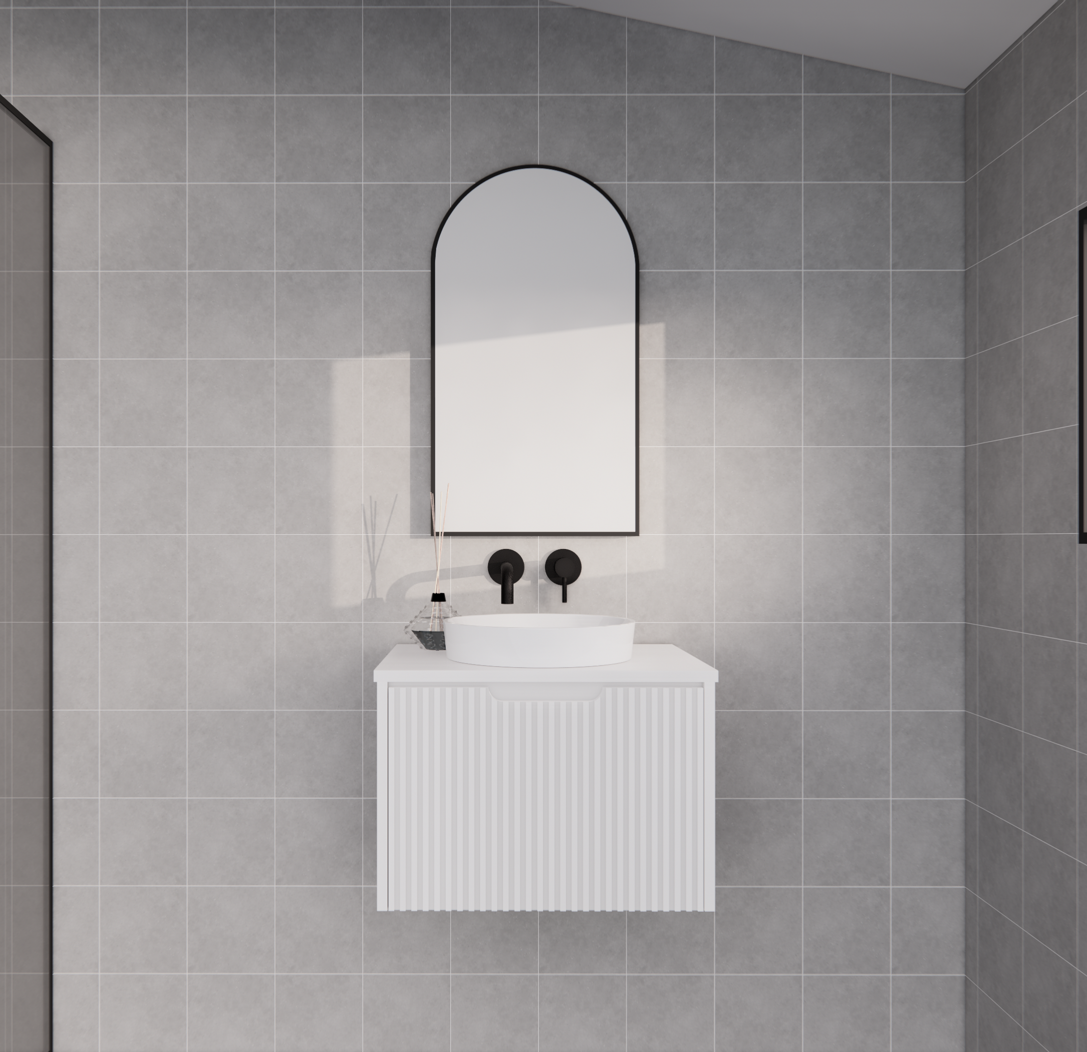 Modern white wall-hung bathroom vanity with fluted front and vessel sink in a grey tiled bathroom