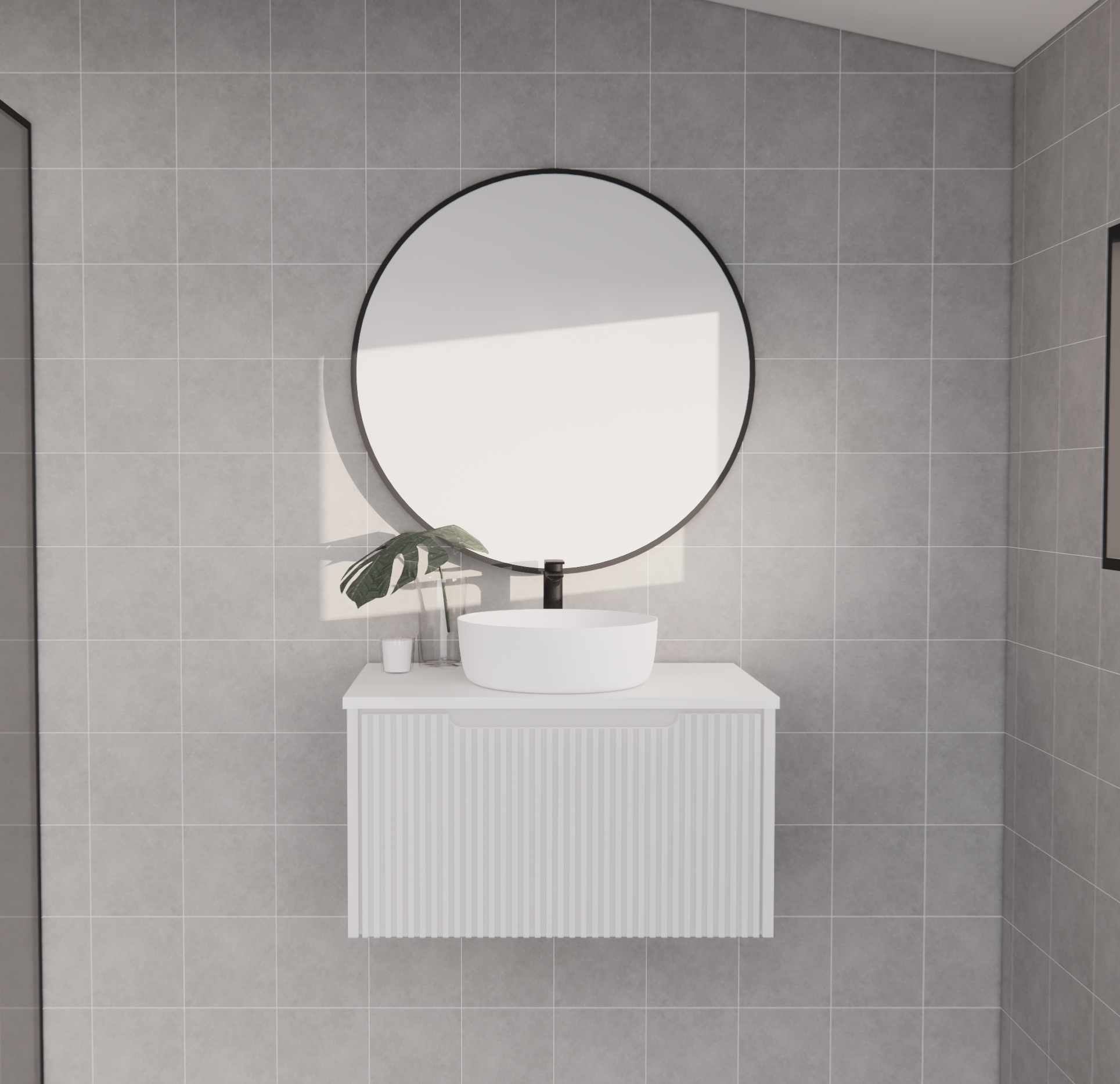 Modern white wall-hung bathroom vanity with vessel sink and round mirror in a tiled bathroom