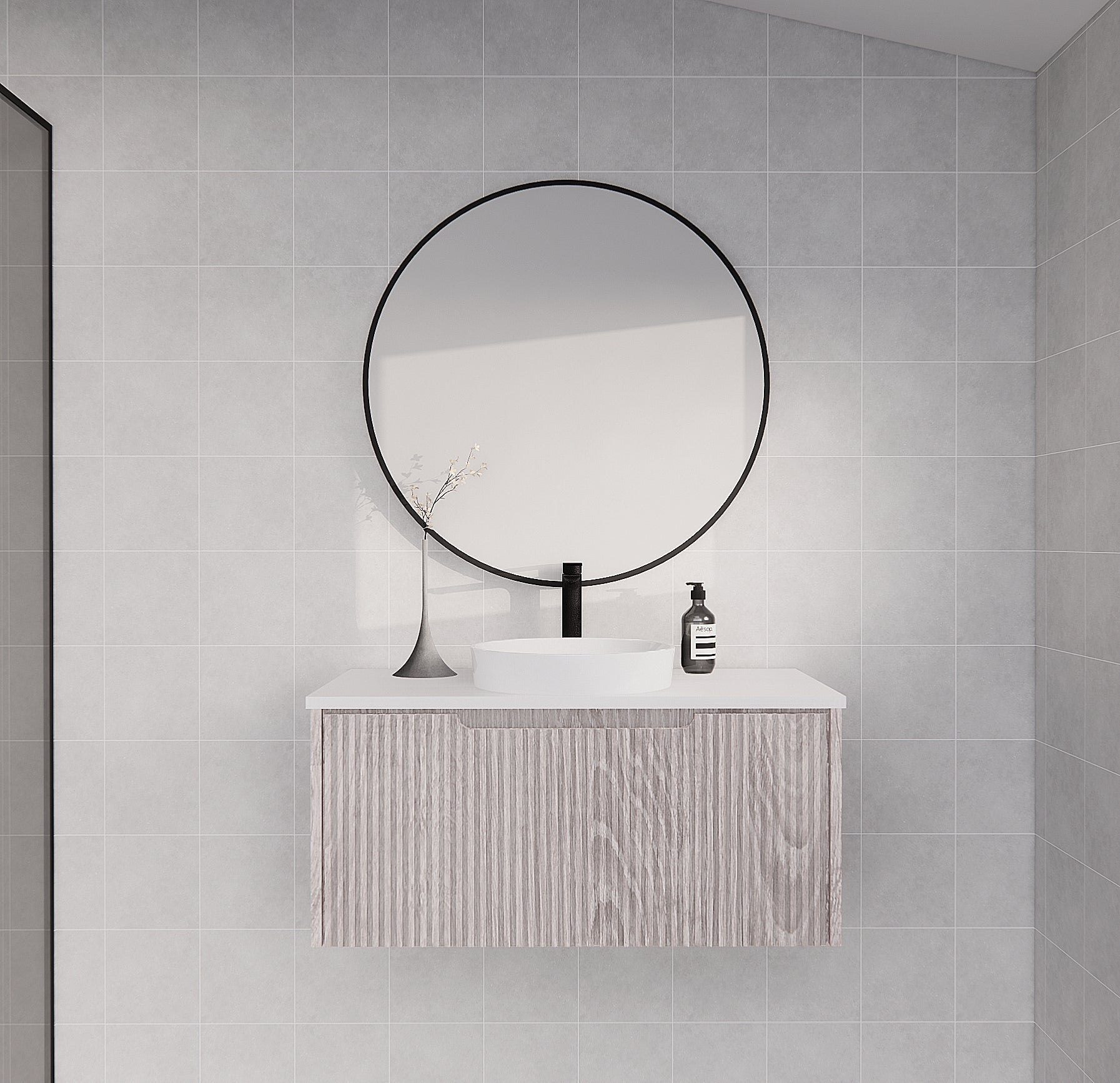 Modern wall-hung bathroom vanity with round mirror and countertop basin in minimalist setting