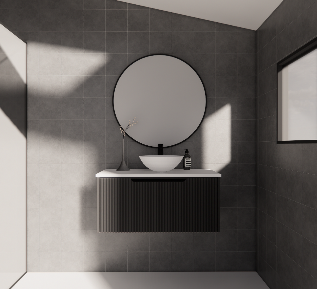 Modern black wall-hung bathroom vanity with vessel sink and round mirror in a tiled ensuite