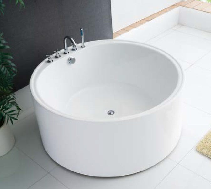 Elegant FS19 round freestanding bath serving as the centerpiece in a modern bathroom.