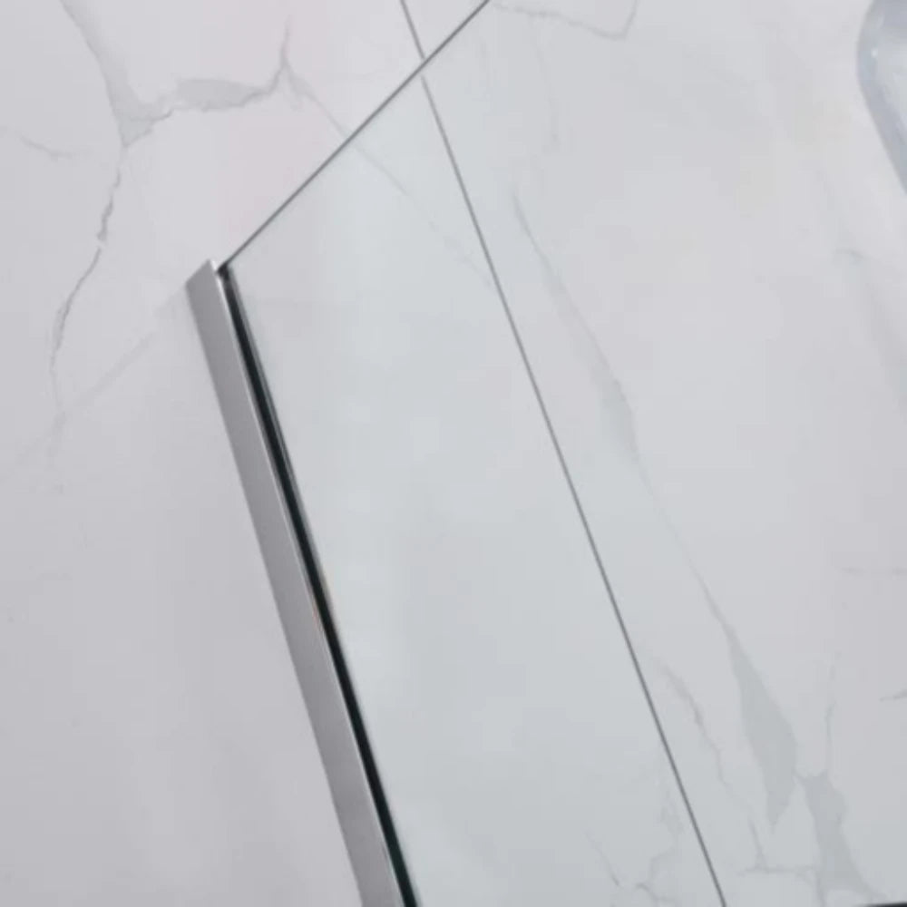 Close-up of a shower enclosure with a glass panel and chrome frame.