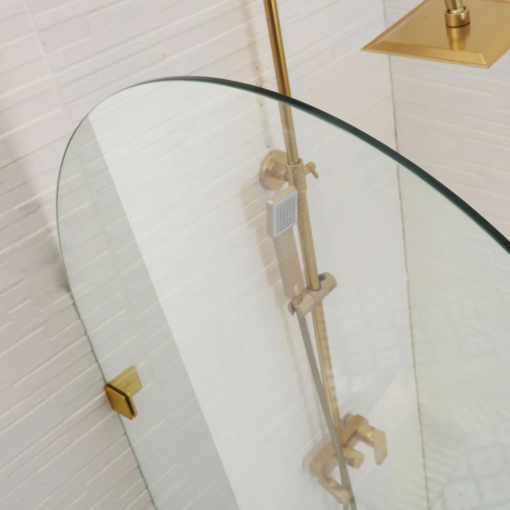 Close-up of top arch clear tempered safety glass detail on Covey frameless walk-in shower screen
