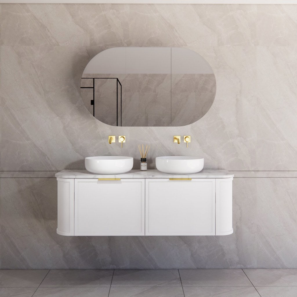 Modern bathroom featuring the Houston matte white curved wall hung vanity 1500mm with brushed gold handles, creating a spacious and contemporary feel.
