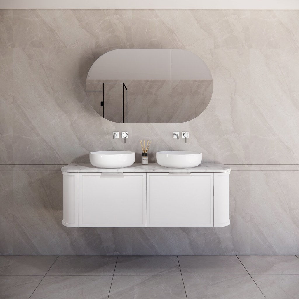 Modern bathroom featuring the Houston matte white curved wall hung vanity 1500mm with brushed nickel handles, creating a spacious and contemporary feel.