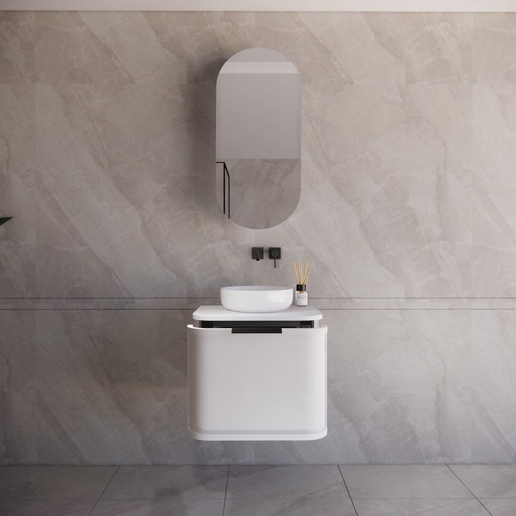 Modern bathroom featuring the  600mm Houston matte white curved wall hung vanity, with stone top and above white round basin, creating a spacious and contemporary feel.
