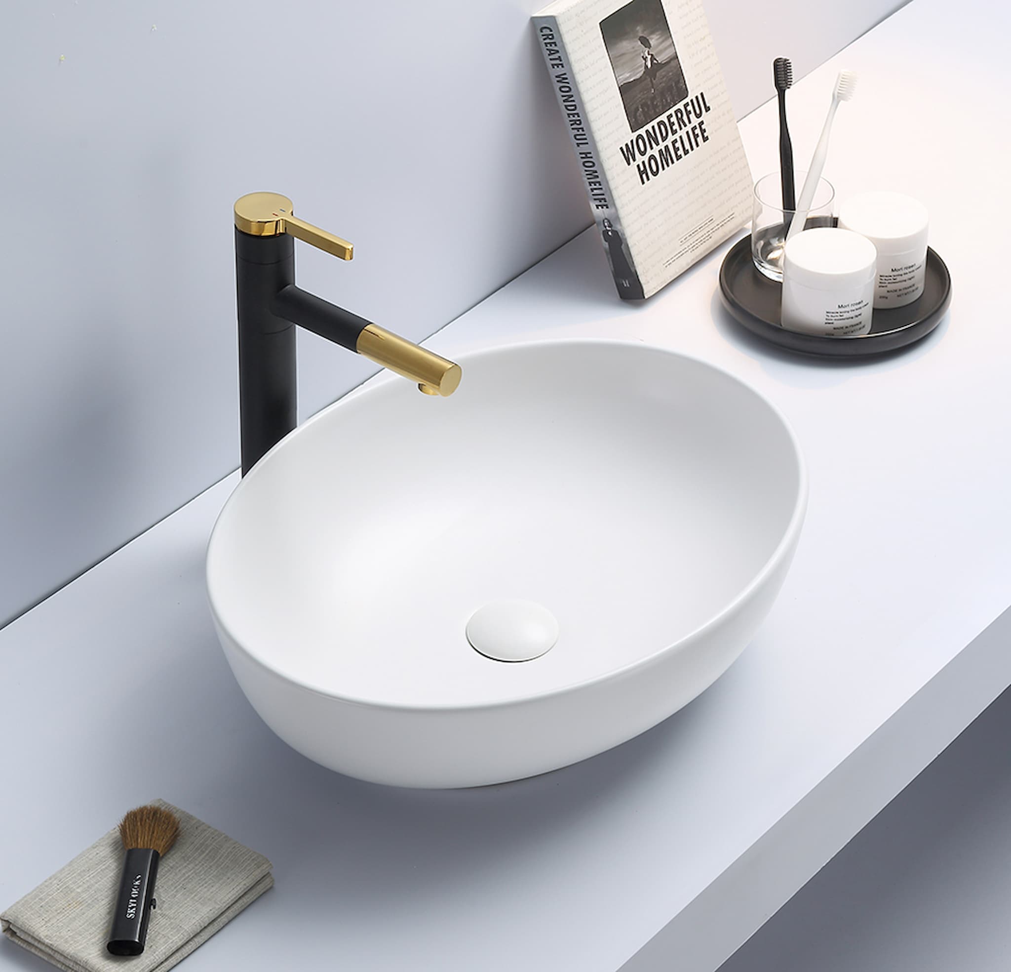 Lukka Carey 520mm oval fine ceramic above counter basin (LK-CRA520-MW) in Matt White, featuring a seamless, no-overflow design.
