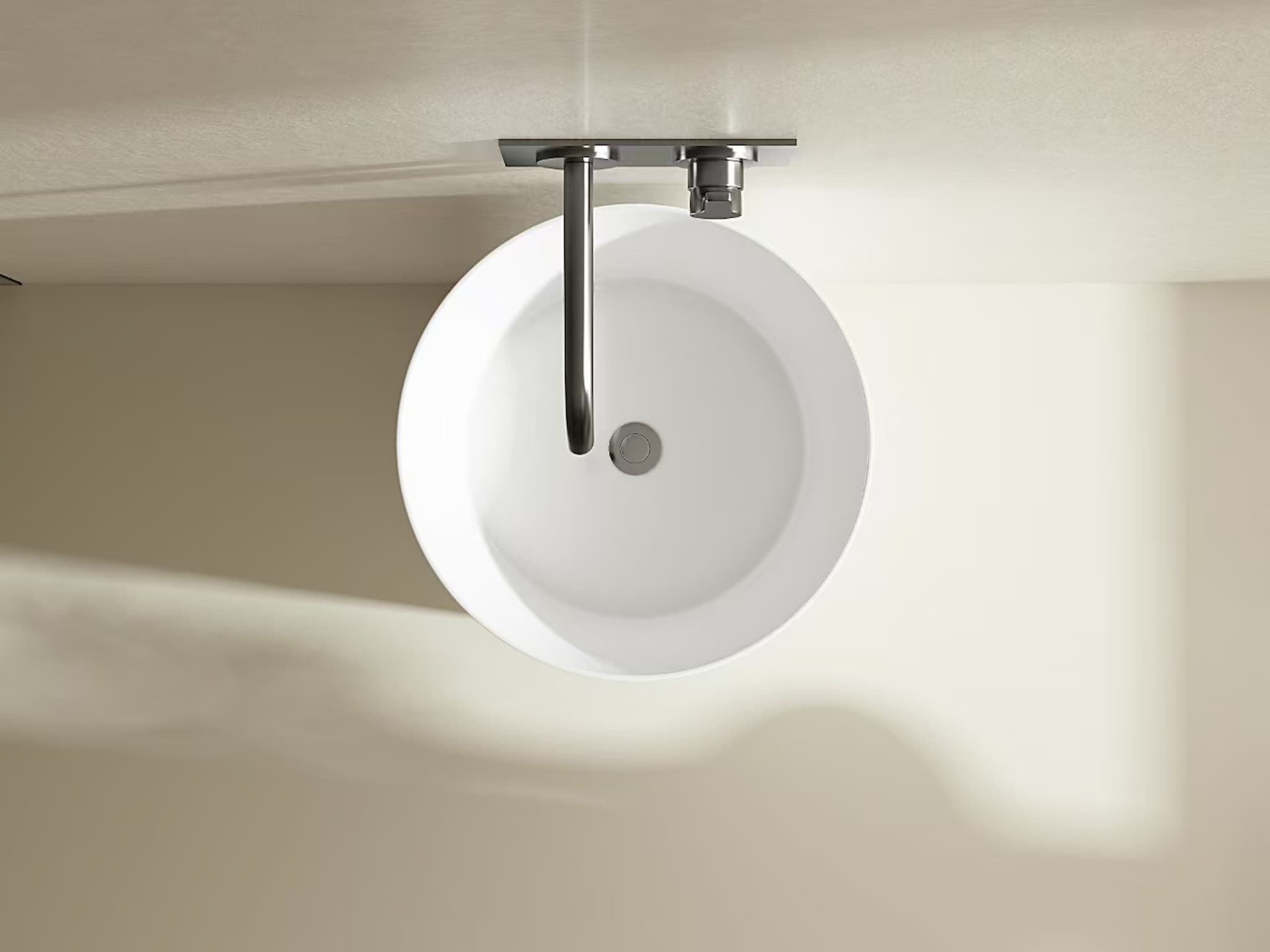 Lukka Carrida Fine Ceramic Free Standing Pedestal Basin, round shape, 445×455×860 mm, Matte White finish  with chrome faucet on a beige wall