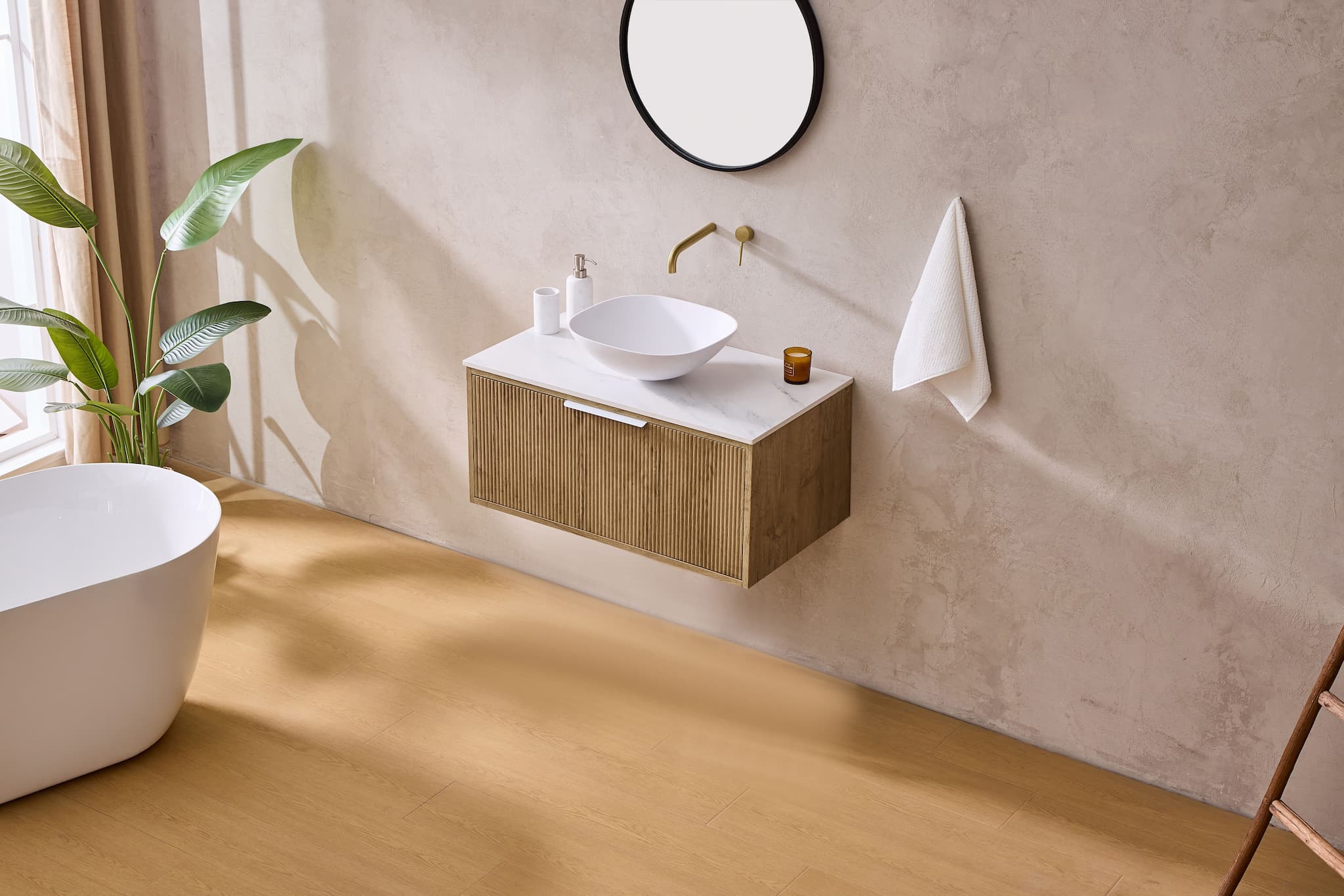 Modern bathroom with floating oak vanity, round mirror, vessel basin, and freestanding bath from Secasa Home