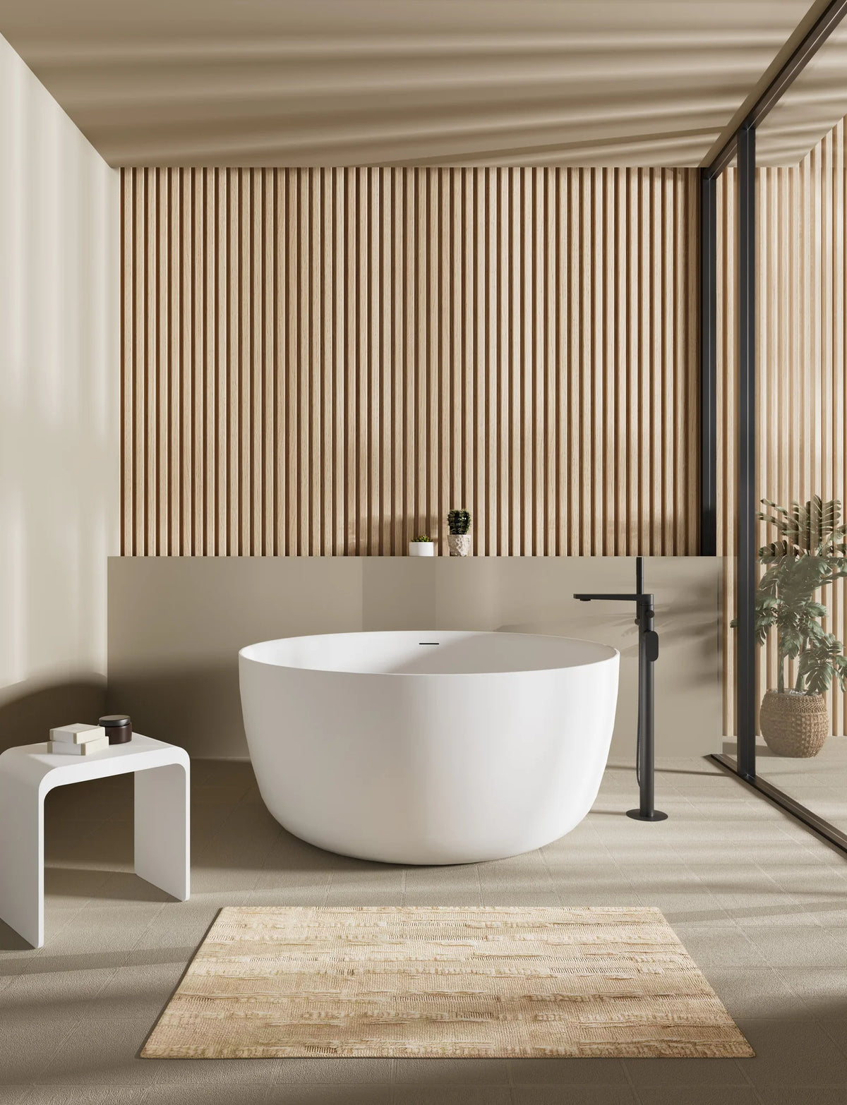 Lukka Olley 1350mm round freestanding acrylic bathtub in a bathroom