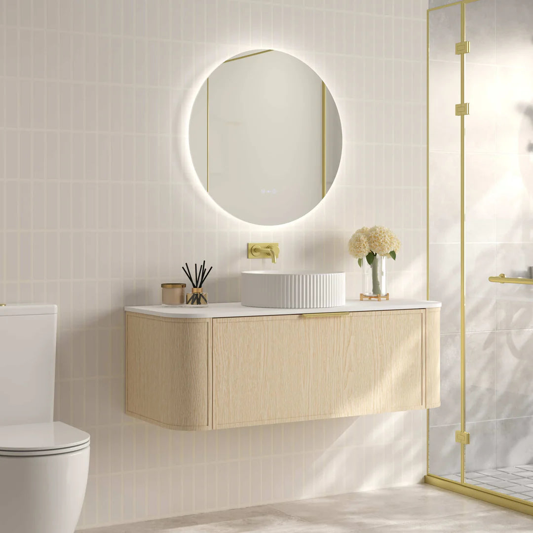 Side view of Mercio Elva 1190mm Curved Wall-Hung Vanity in Natural Oak, illustrating its elegant curved profile, space-saving wall-hung design, and seamless integration with a modern bathroom.