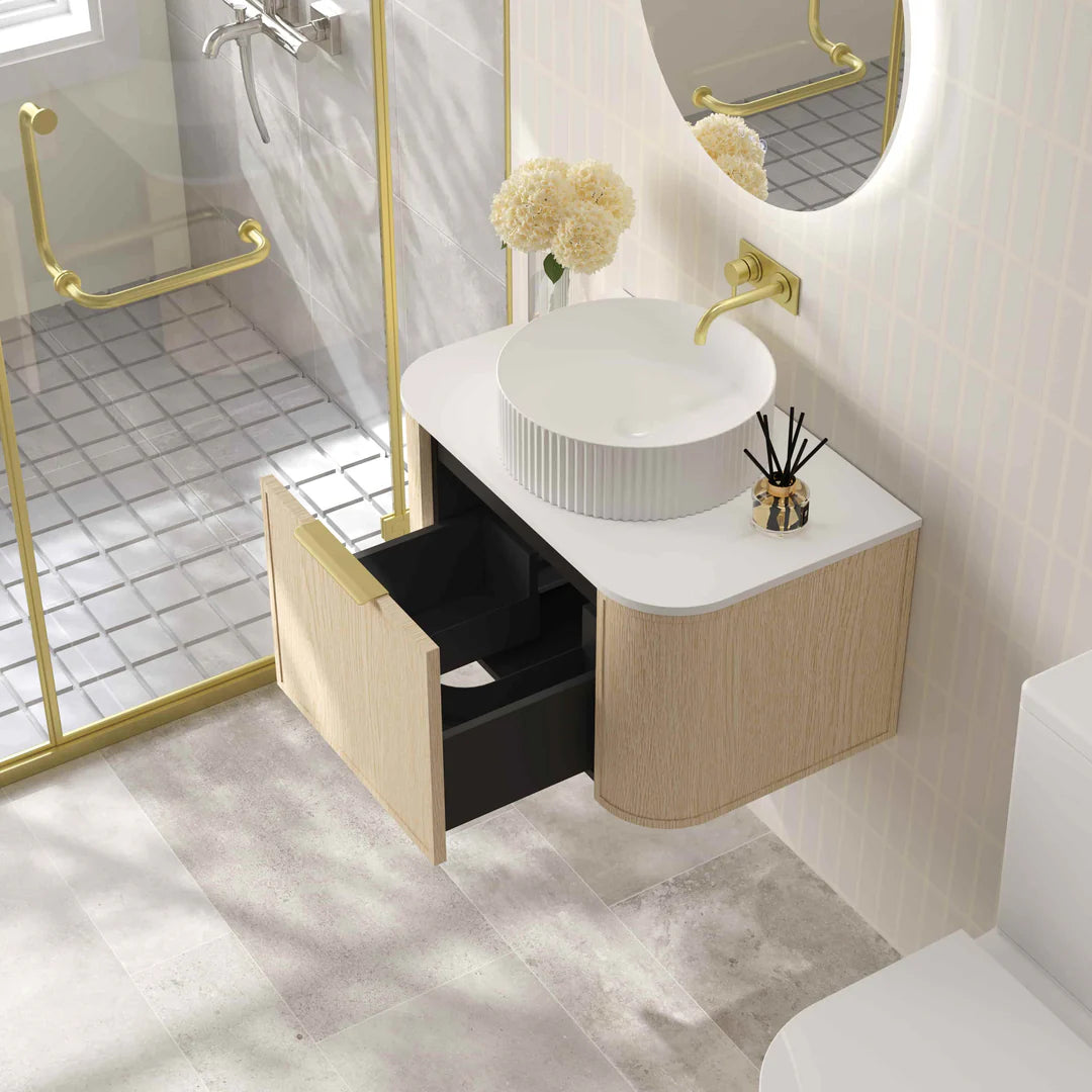 Open view of Mercio Elva 740mm Curved Wall-Hung Vanity in Natural Oak, showcasing its organized interior storage within a single soft-close drawer.