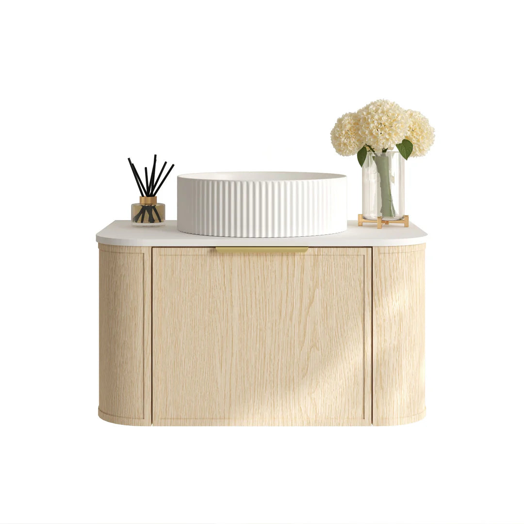 Front view of the Mercio Elva 740mm Curved Wall-Hung Vanity in Natural Oak, highlighting its sleek single soft-close drawer, premium rounded edges, and ready for a counter-top basin.