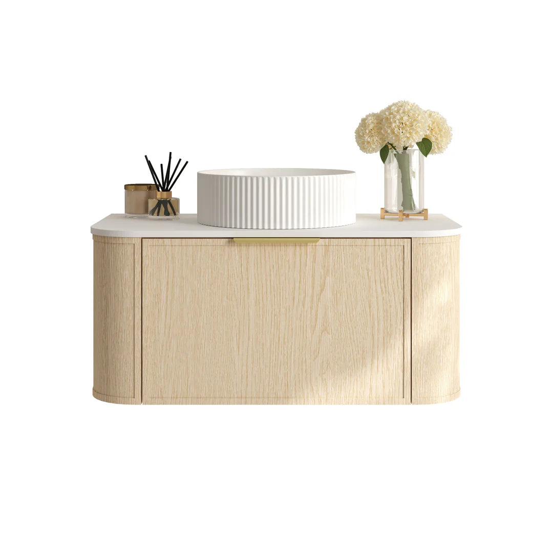 Front view of the Mercio Elva 890mm Curved Wall-Hung Vanity in Natural Oak, highlighting its sleek single soft-close drawer, premium rounded edges, and ready for a counter-top basin.