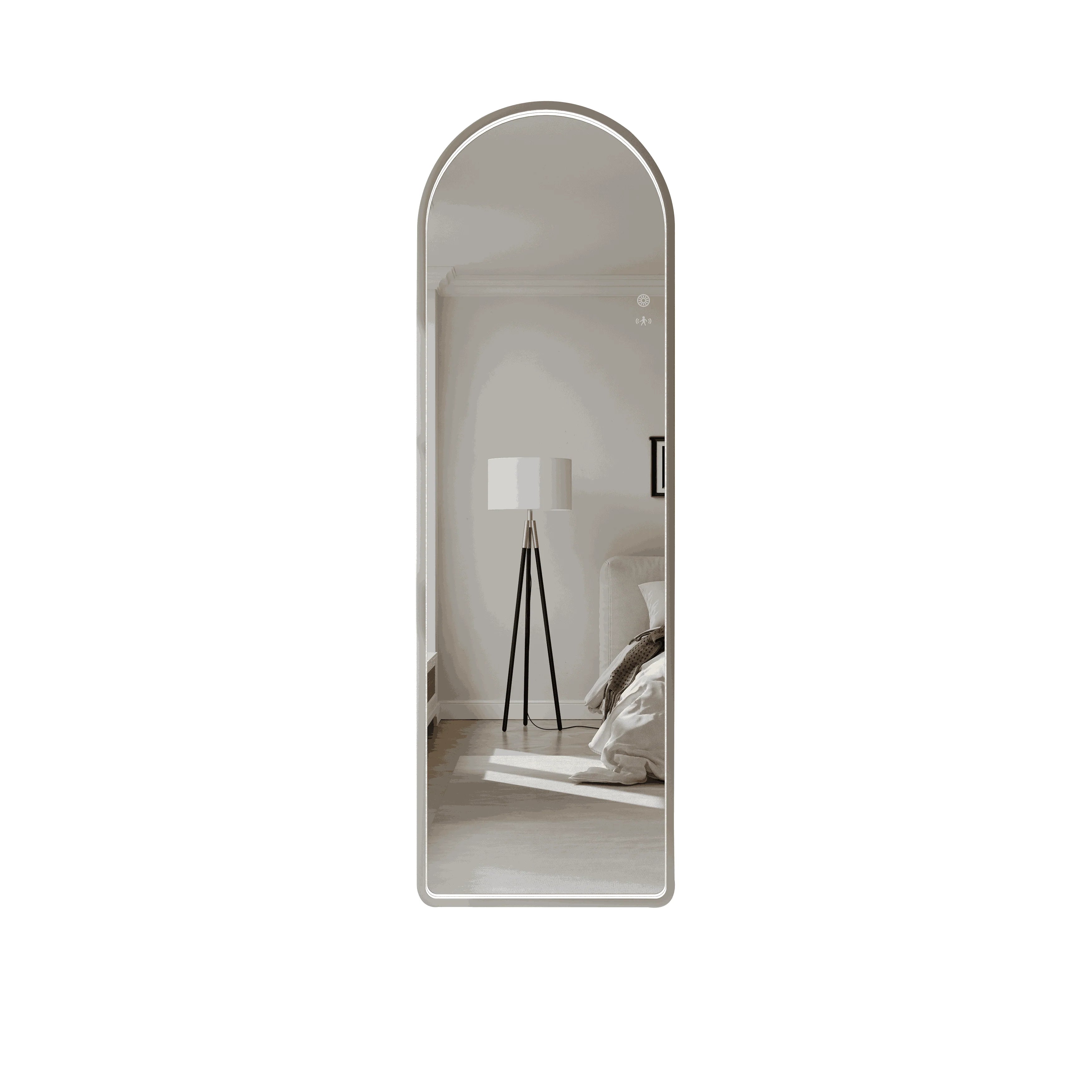 Modern arch LED bathroom mirror with brushed nickel frame, reflecting minimalist bedroom decor.