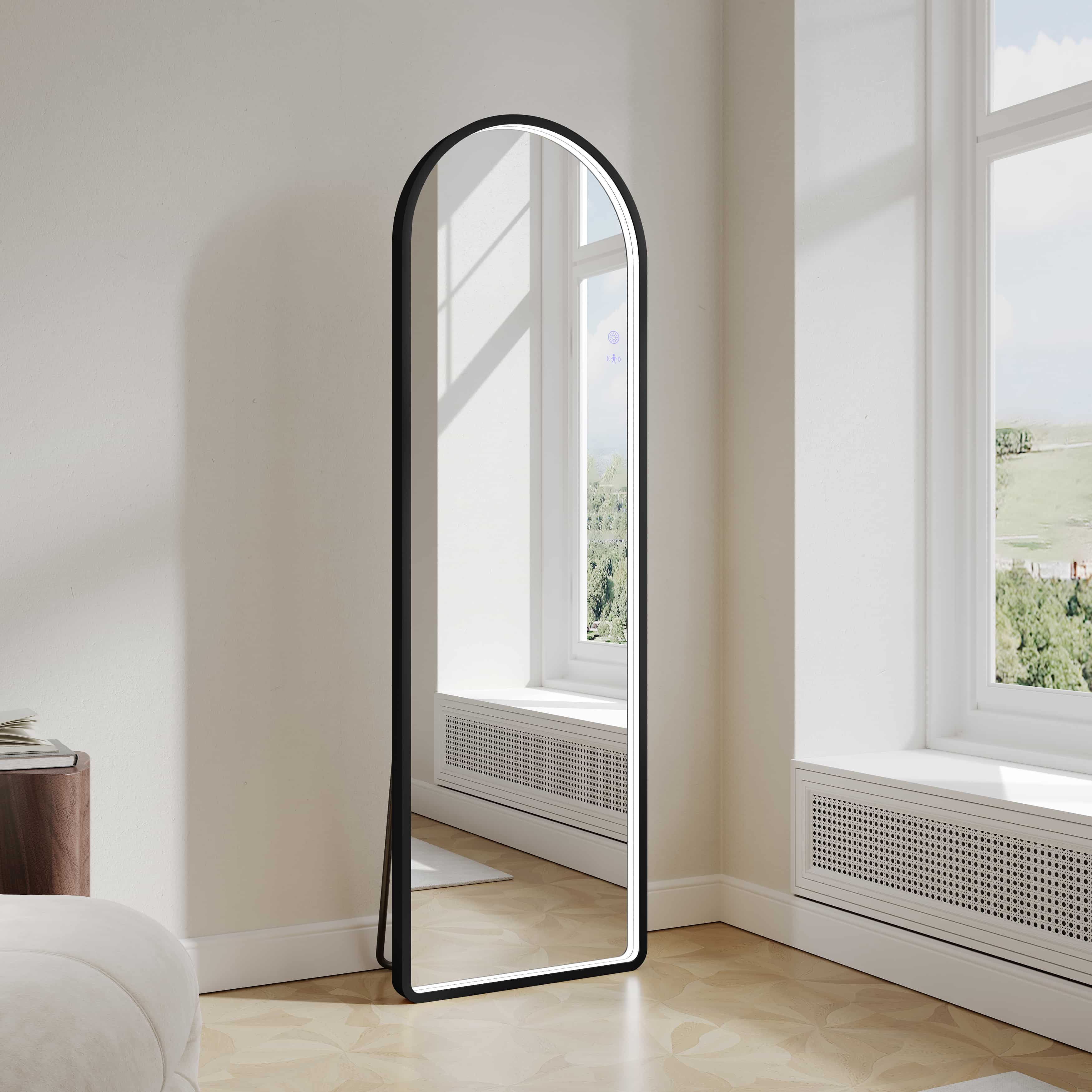 Modern freestanding arch LED mirror with matt black frame in sunlit room, Secasa Home
