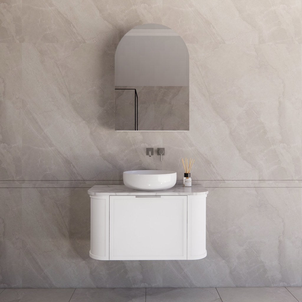Modern bathroom featuring the Riva Houston matte white curved wall hung 900mm vanity with brushed nickel handle, creating a spacious and contemporary feel.