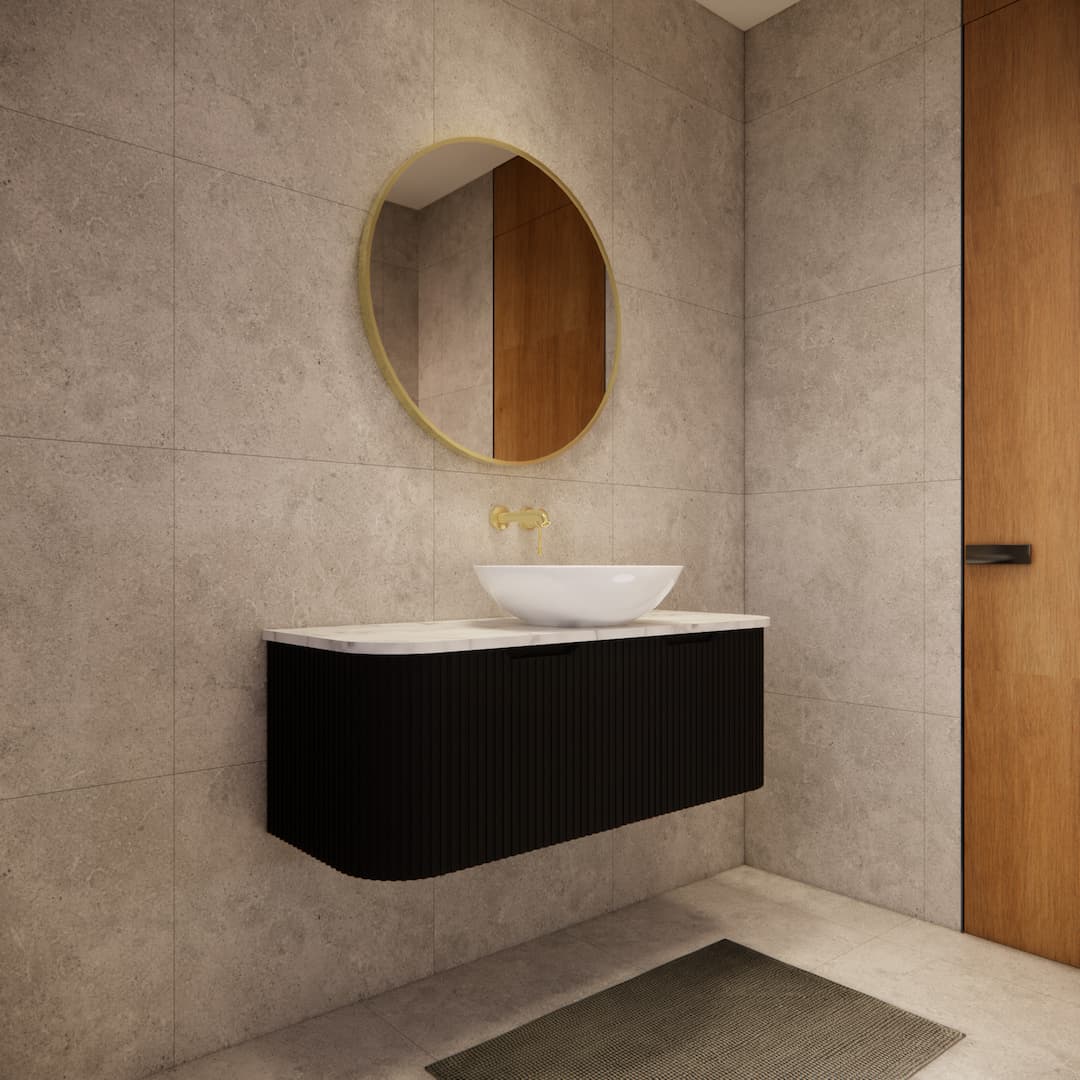 Modern bathroom with matte black fluted vanity, vessel sink, round mirror, and stone tiles