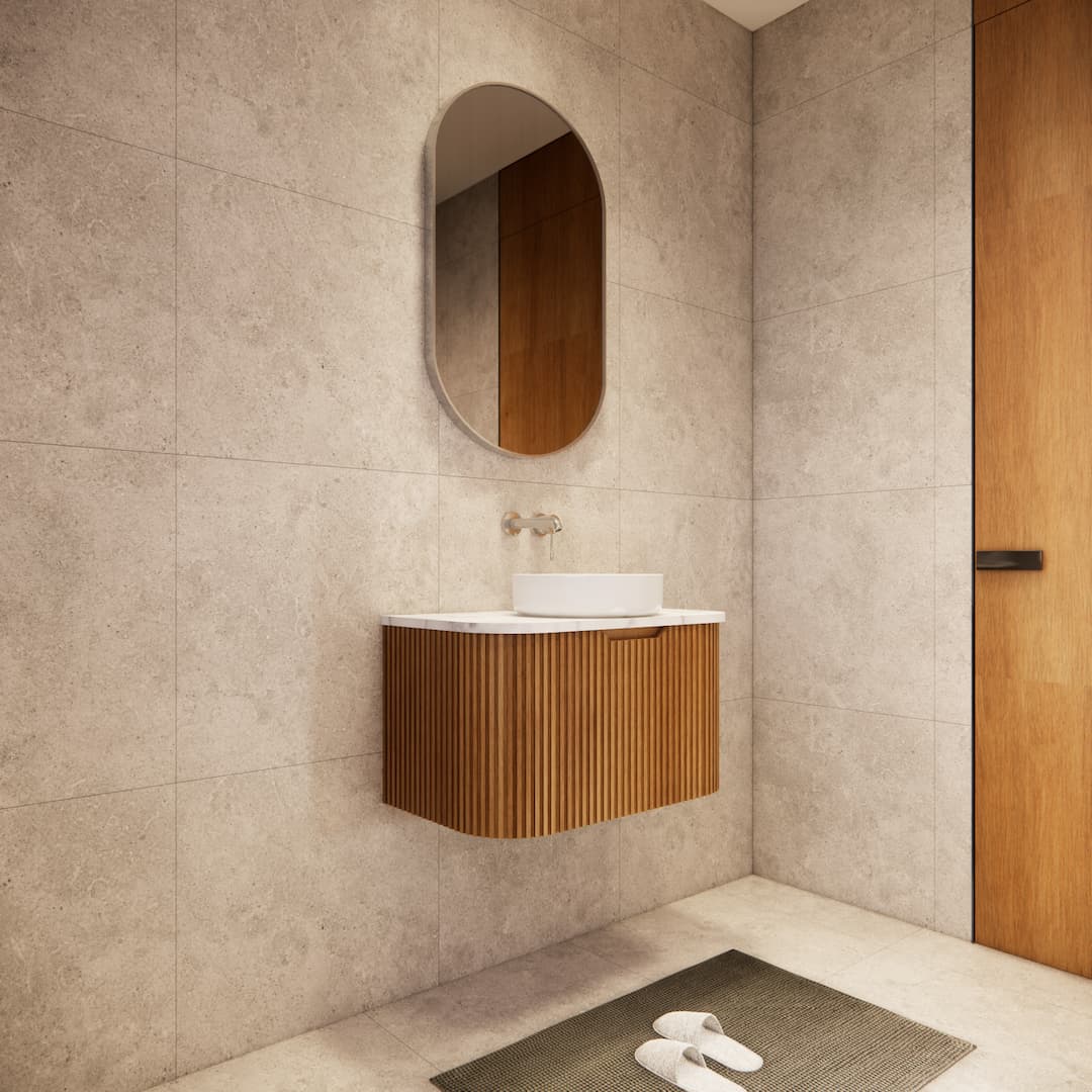 Modern bathroom with space-saving fluted timber vanity, oval mirror, and stone tiles